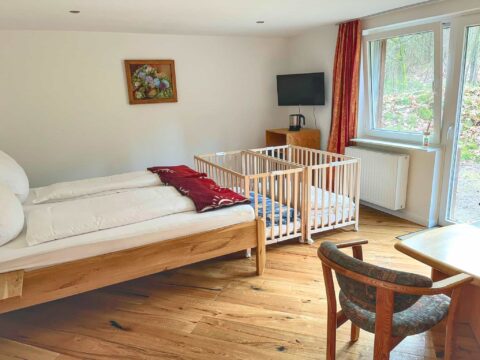 Waldhäuschen Amsel Wohnschlafbereich